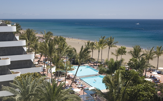 Aerial view of the Suite Hotel Los Fariones and Playa Blanca or Playa Grande