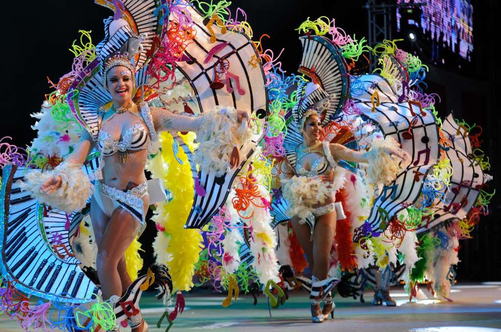 Carnival comparsa with elaborate costumes during Playa Blanca Carnival 2026